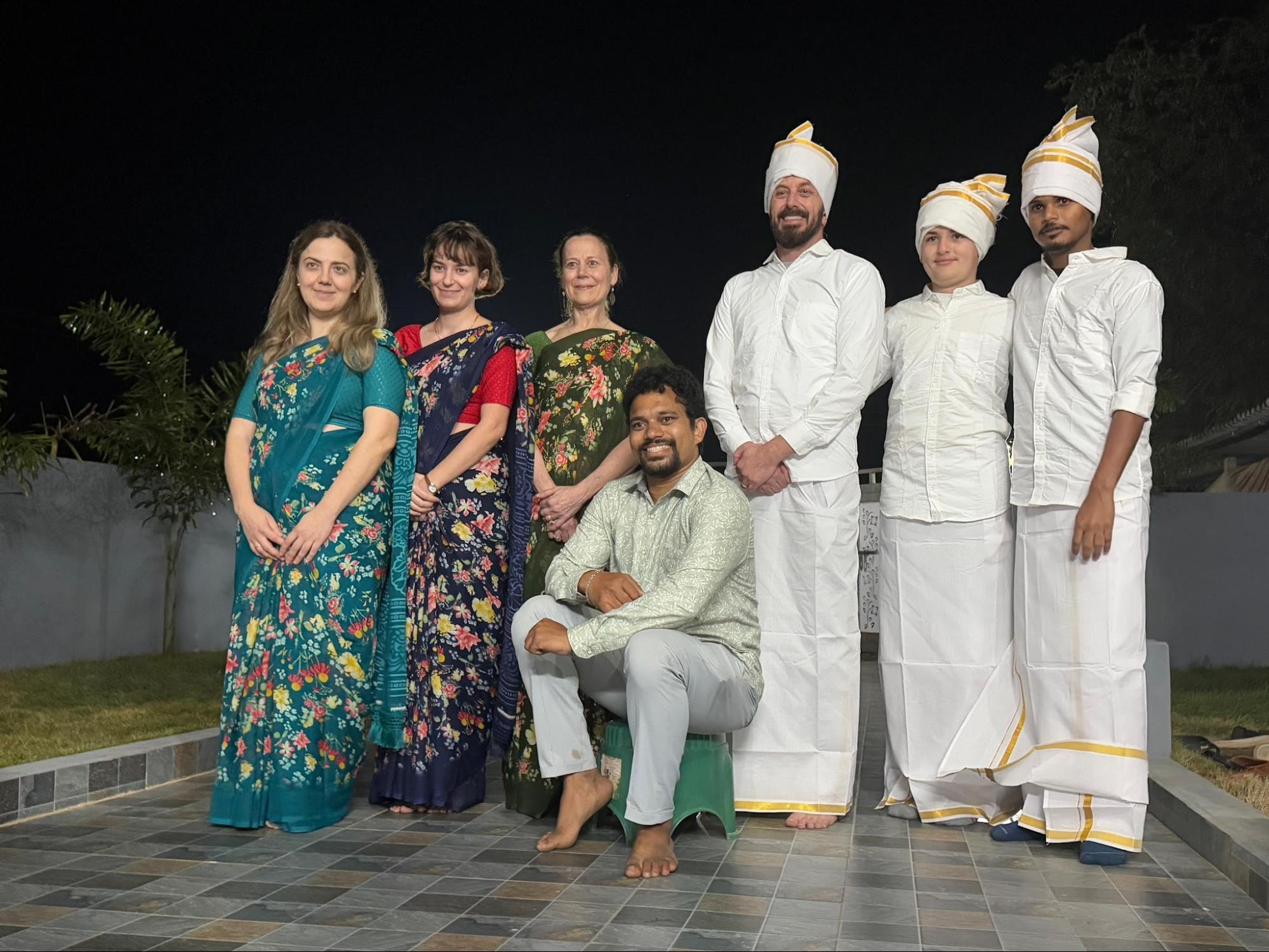 Visiting team and local leaders dressed in traditional Indian attire