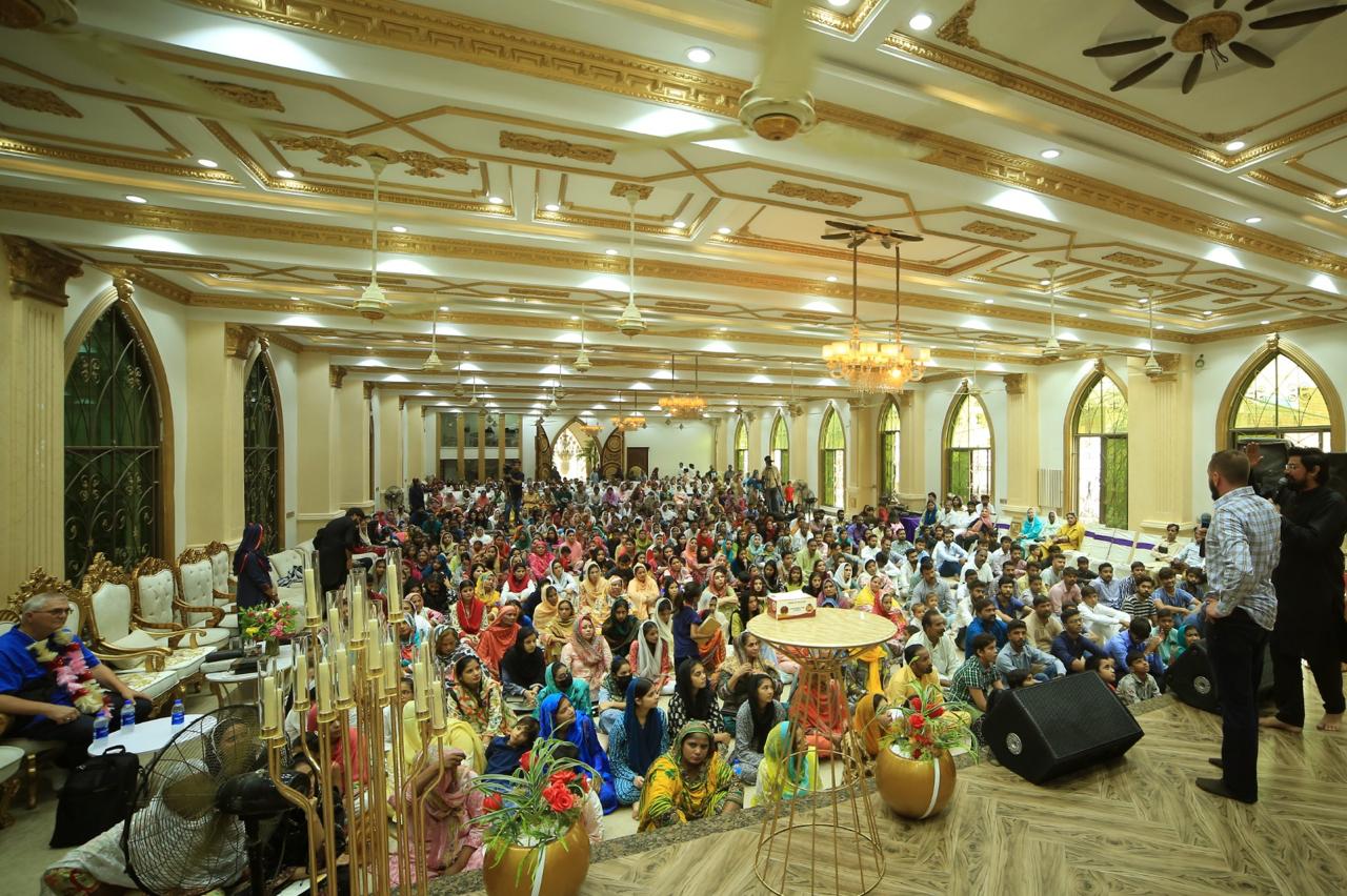 A large ministry gathering inside a hall in Pakistan